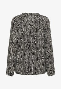 Valimata, black wavy dots