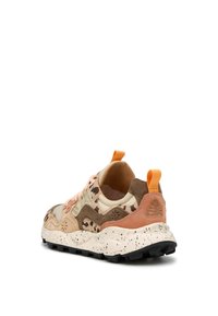Multicolored sneaker featuring a cream, brown, and pink upper with a speckled sole, textured accents, and a pull tab at the back.