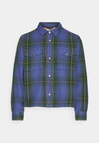 Rutig skjorta med knappar i en blå och grön färgskala med gula detaljer. Den har två framfickor och en klassisk krage.