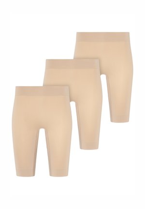Three pairs of seamless beige knee-length shorts arranged in a staggered formation with wide waistbands.