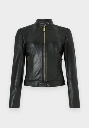 Black leather jacket with a high collar, zip closure, diamond-quilted shoulders, two zippered pockets, and a fitted design. Gold accents.