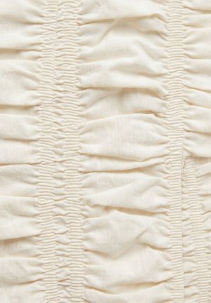 Cream-colored fabric with vertical rows of gathered, ruched stitching creating textured, puckered stripes.