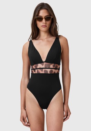 Zwart eenteil badpak met een diepe V-hals en een panterprintpaneel bij de taille. Beschikt over een hoge snit bij de benen en dunne bandjes.