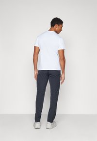 Houdini MORE PANTS - Outdoorové nohavice - true black