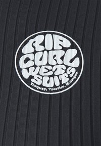 Black ribbed material with a prominent white circular logo reading "RIP CURL WETSUITS" featuring smaller text beneath.