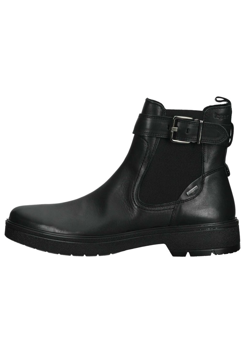 Stivaletto in pelle nera con pannello elastico laterale, dettaglio con fibbia, suola in gomma piatta e texture liscia. Adatto per un abbigliamento casual.