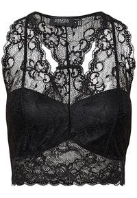 Bralette de encaje negro con patrones florales, sección superior transparente y tela texturizada. Presenta un borde festoneado en la parte inferior.