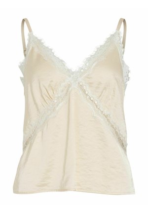 Top na ramiączkach z koronkową lamówką w jasnobeżowym kolorze. Posiada dekolt w serek, cienkie ramiączka oraz dekoracyjne frędzle wzdłuż krawędzi. Gładka, satynowa faktura.