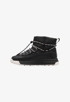 Black high-top boot with a padded ankle collar. Features a textured upper, contrasting white sole, and reflective laces for secure fit.