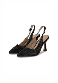 Tacchi slingback neri con punta appuntita, decorati con perline nere, caratterizzati da un bordo ondulato e un sottile tacco a stiletto.