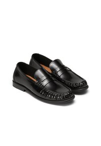 Loafers negri din piele, cu cusături decorative, având vârful rotunjit și o finisare netedă. Talpa este plată și ușor texturată.