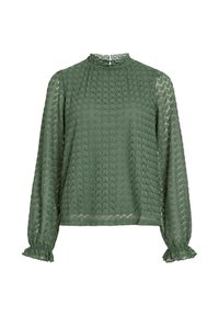 Groene blouse met lange mouwen van textuurstof met een hexagonaal patroon, hoge hals en geruffles aan de mouwen. Heeft een subtiele glans.