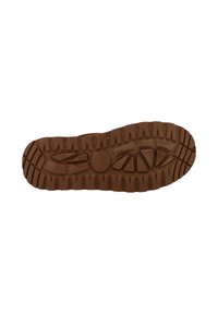 Semelle en caoutchouc, marron avec des rainures profondes. Comprend des motifs de traction et une zone surélevée circulaire pour une meilleure adhérence. Surface lisse dans l'ensemble.