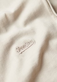 Superdry & Co ESSENTIAL beżowy