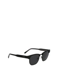 Occhiali da sole neri con forma rettangolare, finitura opaca, lenti scure e un braccio testurizzato con il logo Lacoste.