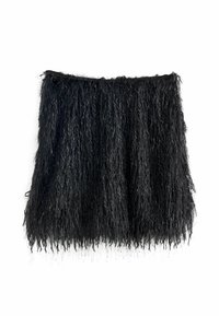 Black fringed skirt made of textured fabric, featuring long strands and metallic accents for added detail. Lightweight and flowy design.