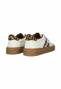 White low-top sneakers with tan rubber soles and leopard print accents on the heel collar and side panels, viewed from the back.