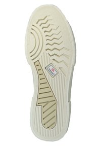 Podeszwa buta w off-white gumie z teksturowanym wzorem gripu, w tym rowkami i okrągłymi wzorami; posiada logo marki.