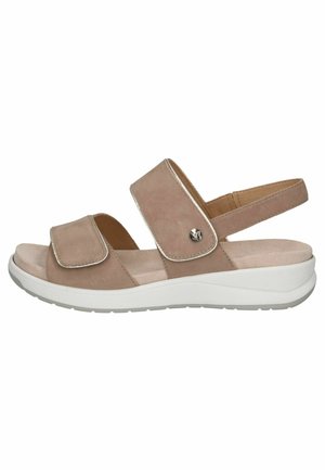 Sandale beige à bout ouvert avec deux brides réglables et semelle blanche coussinée, conçue pour le confort et un port décontracté.