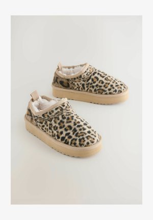 Slip-on topánky so vzorom leopardie kože, s mäkkým vyplnením, béžovým lemom a textúrovanou podrážkou pre lepšiu priľnavosť. Mäkká umelá kožušina poskytuje teplo a pohodlie.