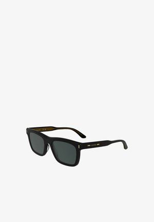 Schwarze rechteckige Sonnenbrille mit dunklen Gläsern, goldenen Akzenten an den Bügeln und einem Rahmen mit mattem Finish. Elegantes, minimalistisches Design.