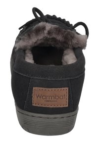 Black suede slipper with a plush gray lining, round toe, and brown leather label at the heel. Features adjustable laces for fit.