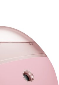 Dispositif rose rond avec un dessus en forme de dôme brillant et translucide. Présente une petite ouverture ronde à la base pour sa fonctionnalité.