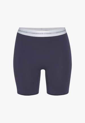 Marineblaue enganliegende Shorts mit einem weißen elastischen Bund, der mehrfach den Schriftzug "Copenhagen Studios" trägt.