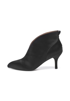 Black satin ankle boots with a pointed toe, side zipper, and a 2.5-inch stiletto heel. Features a smooth texture and sleek design.