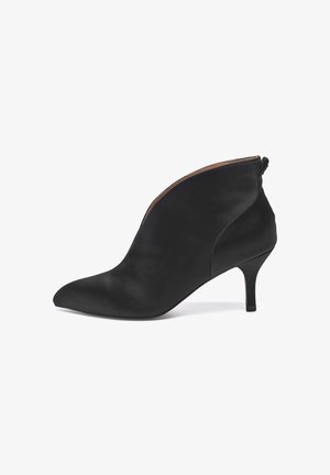 Black satin ankle boots with a pointed toe, side zipper, and a 2.5-inch stiletto heel. Features a smooth texture and sleek design.