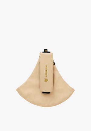 Fascia elastica beige in tessuto con linguette nere, piegata e marchiata con "WILDRIDE" e un logo leopardo in lettere dorate.