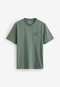 Kortärmad t-shirt med rund hals i dämpad grön bomull. Har en ficka på vänster bröst. Slät struktur, standard passform och enfaldig design.