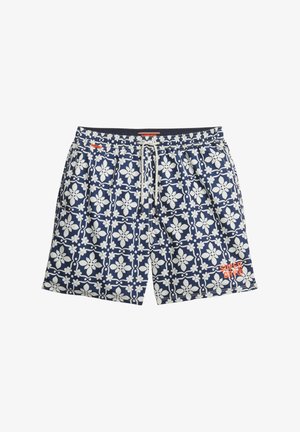 Navy Schwimmshorts mit einem weißen Blumenmuster, elastischem Bund mit Kordelzug. Auf der unteren rechten Seite befindet sich ein kleines oranges Logo.