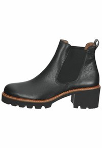 Botín negro de cuero hasta el tobillo con un acabado texturizado, paneles laterales elásticos, punta redonda y tacón ancho de 5 cm. Costuras marrones y suela de goma.