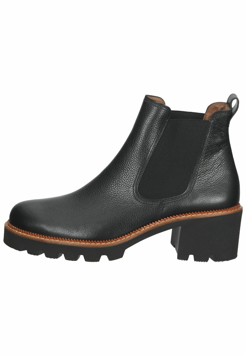 Botín negro de cuero hasta el tobillo con un acabado texturizado, paneles laterales elásticos, punta redonda y tacón ancho de 5 cm. Costuras marrones y suela de goma.