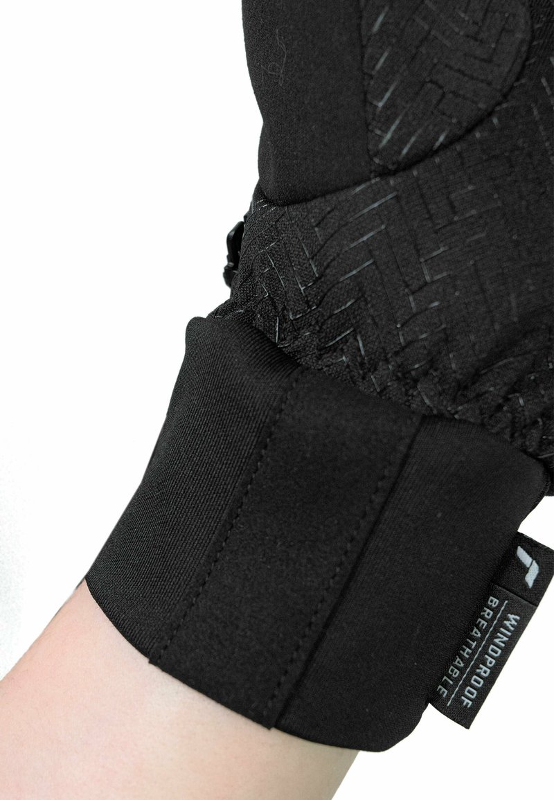 Schwarze, wasserdichte Handschuhe mit einer strukturierten Oberfläche, elastischen Bündchen und einem Etikett, das die Funktionen "WINDDICHT" und "ATMUNGSAKTIV" anzeigt.