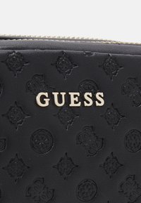 Guess Toalettmappe - black