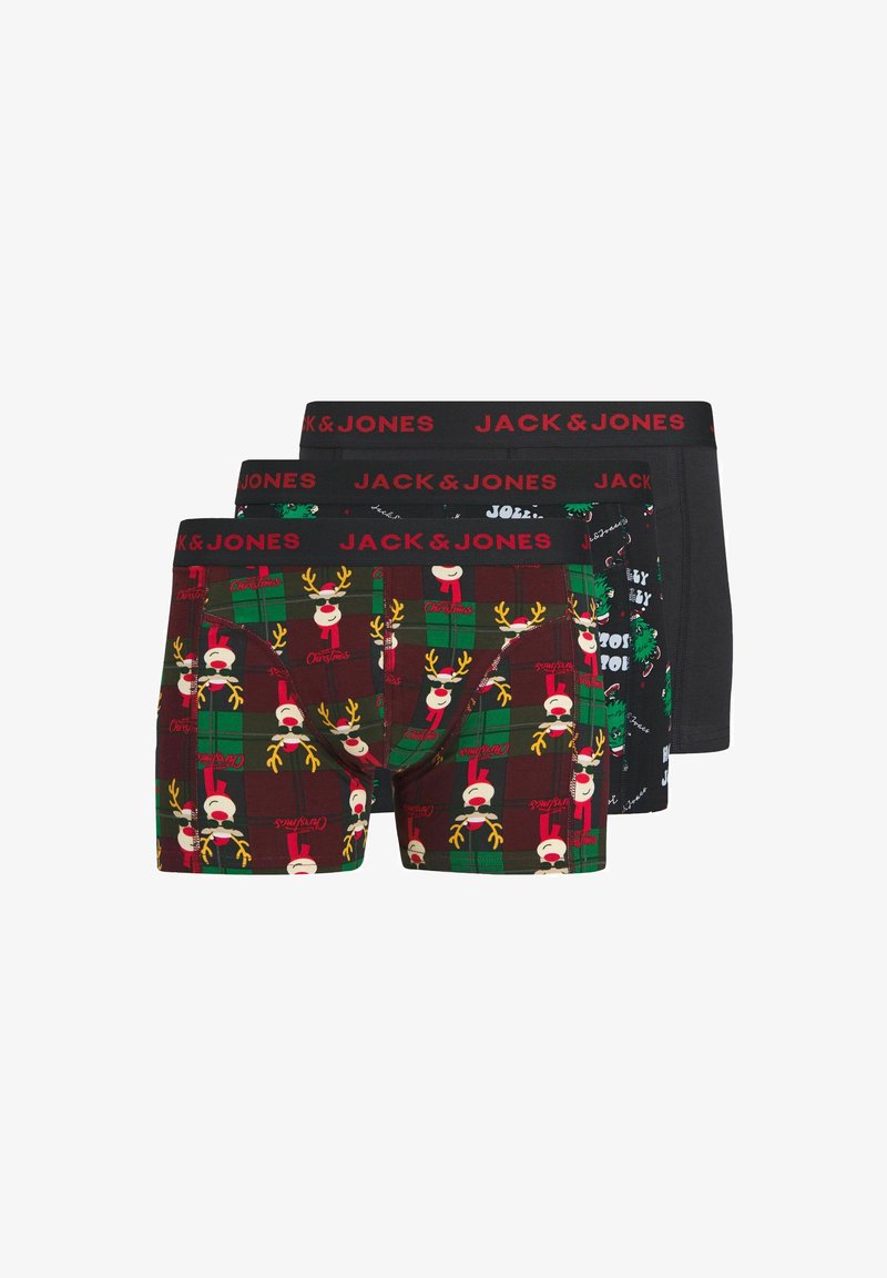 Set van drie boxershorts: één met een patroon van rendieren op ruitjes, één groen met feestelijke tekst en één effen zwart, allemaal met elastische rode taillebanden.