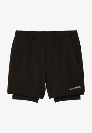 Μαύρο αθλητικό σορτς Calvin Klein με διπλά στρώματα, ελαστική μέση, πλαϊνές τσέπες και λογότυπο στο κάτω αριστερό πόδι.