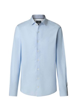 Světle modrá košile s dlouhým rukávem vyrobená z hladké tkaniny, s límečkem na knoflíky a předním zapínáním. Malé logo vyšitá na hrudi.
