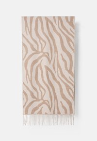 Zebra-mønstret tørklæde i beige og fløde, lavet af blødt stof. Har frynseender og abstrakte bølgelignende designmønstre over det hele.