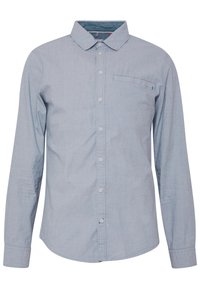 Vaaleansininen pitkähihainen paita, jossa on napitettava etuosa, yksi rintatasku ja avoin kaulus, valmistettu teksturoidusta kankaasta.