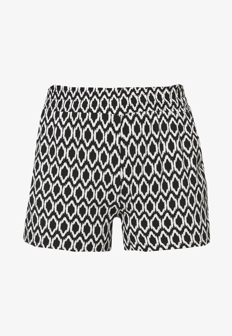 Shorts à motifs en noir et blanc avec une ceinture élastique, présentant un design ikat en forme de losange, fabriqués à partir d'un tissu léger.