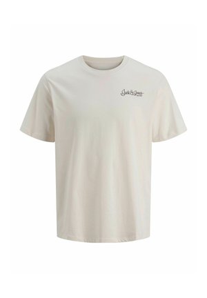 Kreemikas puuvillane t-särk ümara kaeluse ja lühikeste varrukatega. Vasakul rinnal on peen logo. Pehme tekstuur ja lõdvestunud lõige.