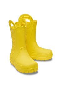 Bright yellow rubber rain boots with textured soles and handles on each side for easy pulling on and off.