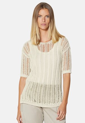 Pull léger de couleur crème, tricoté, avec des manches courtes et un design en mailles ouvertes. Il présente un col rond et une coupe décontractée.