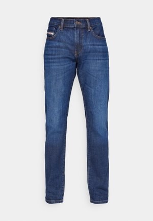 Dark blue denim jeans with a straight-leg cut, featuring a button closure, five pockets, and contrasting stitching. No visible patterns.