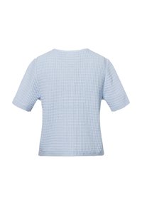 Helles blaues Kurzarmoberteil mit einem strukturierten Waffelstrickmuster. Verfügt über einen runden Ausschnitt und einen leicht lockeren Schnitt.