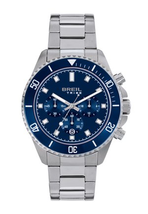 Orologio da uomo Breil Tribe con cinturino in metallo argento, quadrante blu, tre quadranti secondari, finestra del datario e ghiera girevole con segni bianchi.