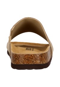 Lichtbruine slipper sandaal met een ronde achterkant, kurken voetbed en een bruine rubberen zool. Getextureerde binnenzolen zorgen voor grip en comfort.